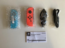 Load image into Gallery viewer, Nintendo Switch Joycon Pair Neon Red and Blue Boxed